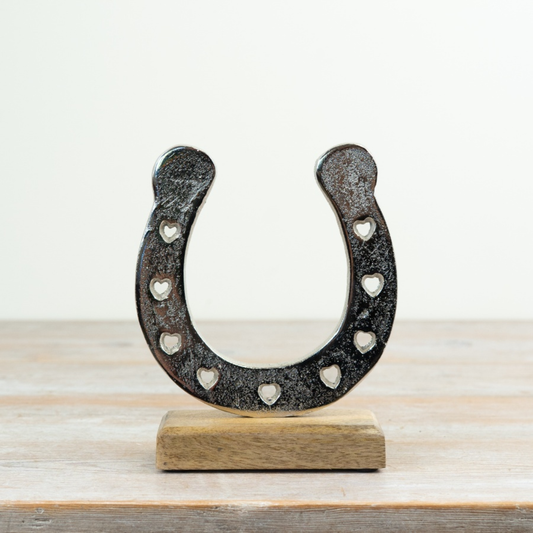 Metal Horseshoe Decoration on Wooden Base